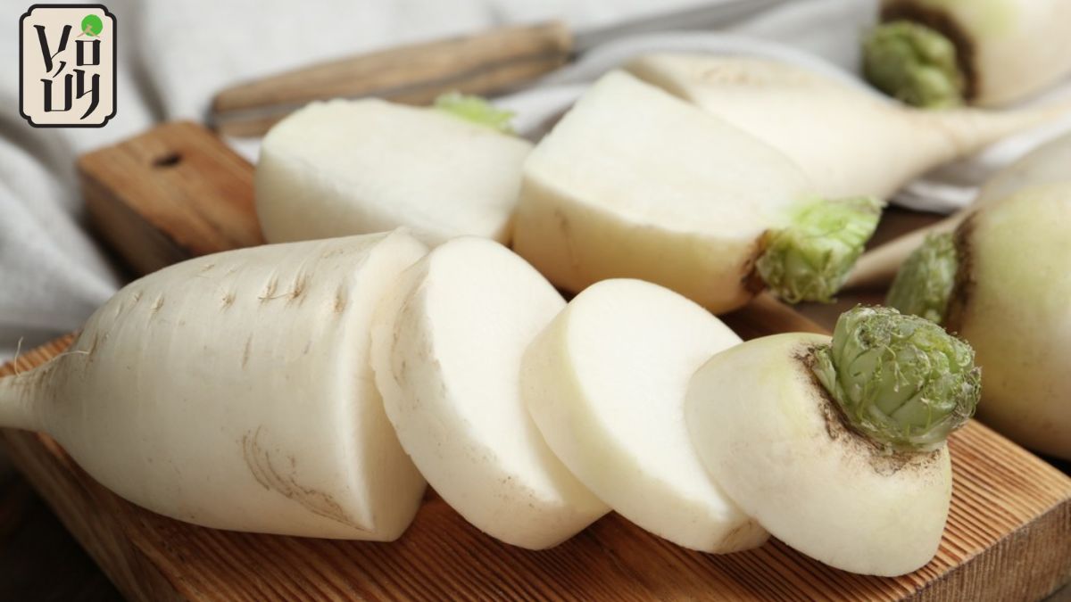 Preparing daikon for vegetarian fermented fish noodle soup broth