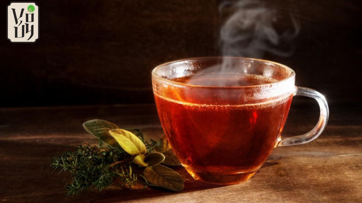 Herbal tea served with vegetarian fermented fish noodle soup